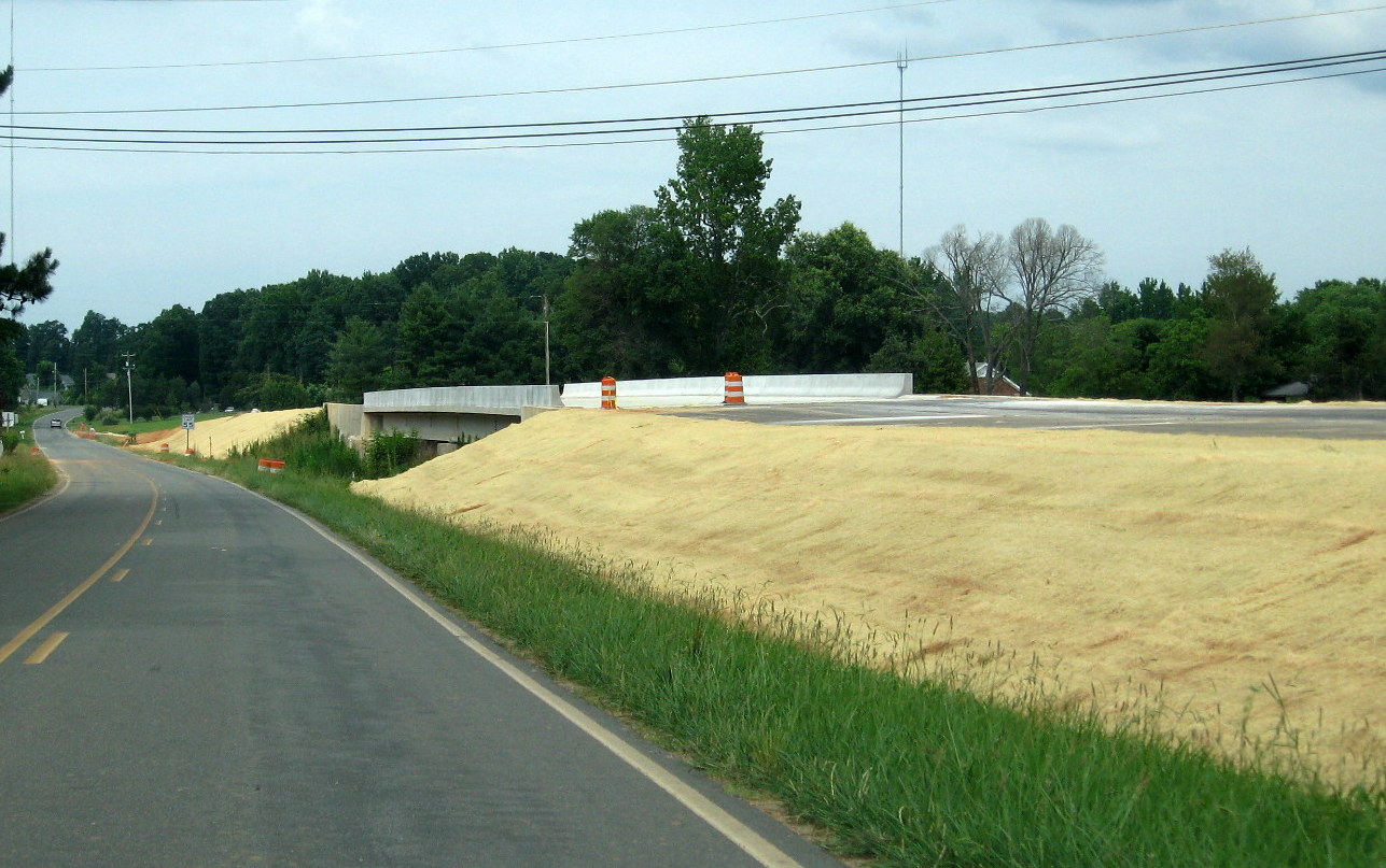 Photo of old alignment of Branson Davis Rd heading north before new bridge was 
completed, June 2012