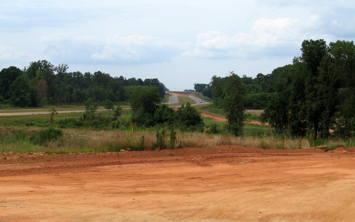Photo showing progress in building exit ramps at US 311 for interchange with 
future I-74 freeway, June 2012