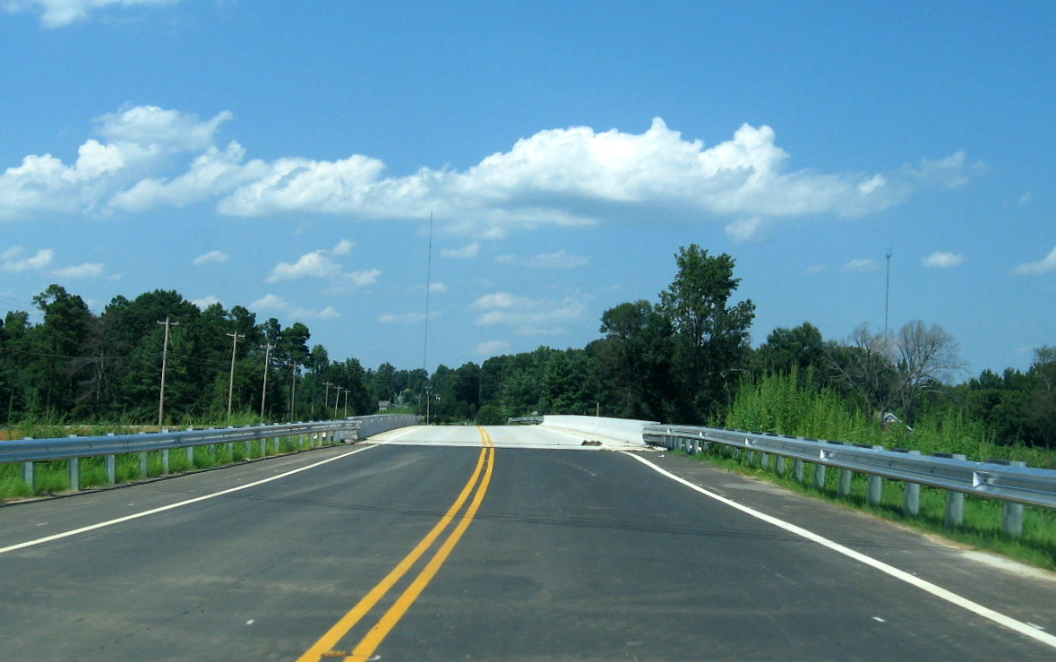 Photo showing driving over newly completed Branson Davis Rd Bridge in late 
July 2012