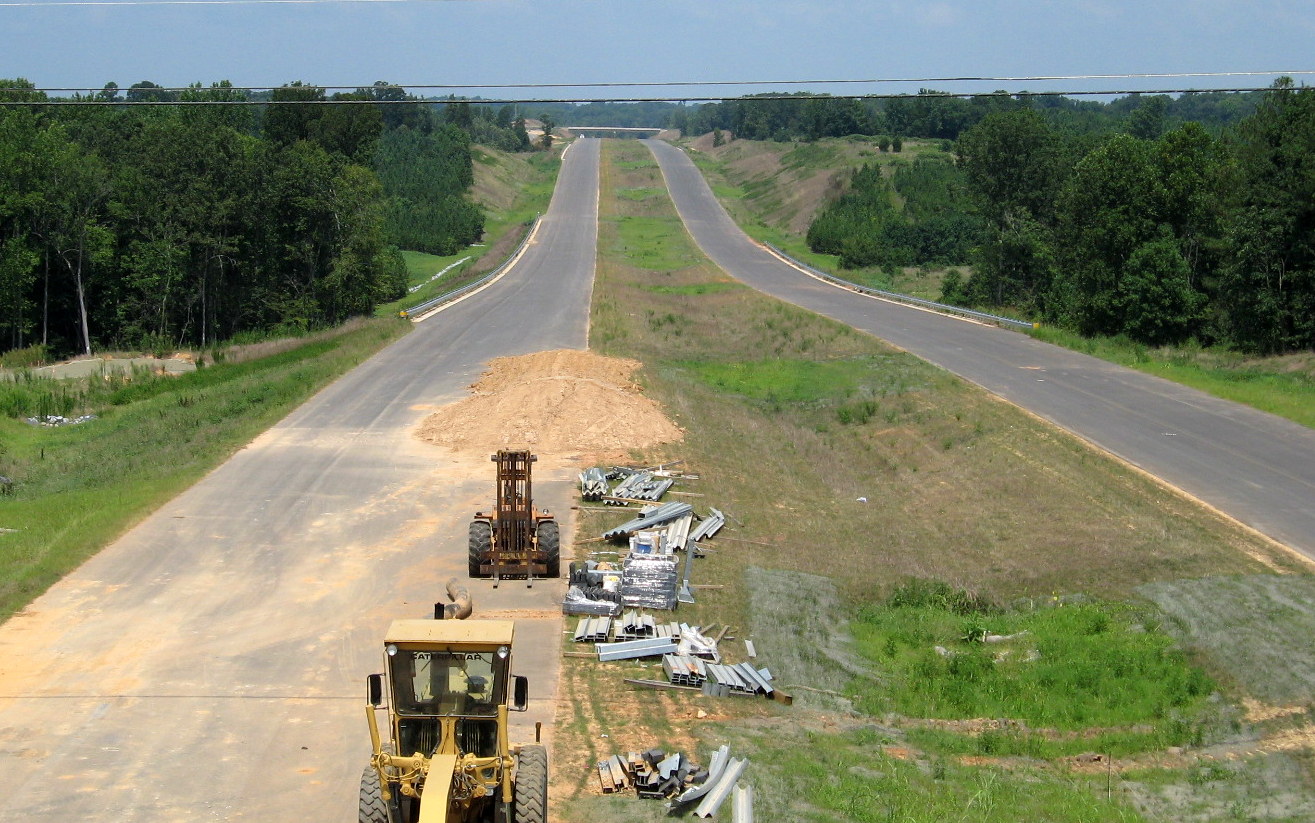 Photo of view north from the Heath Dairy Road Bridge showing the progress in 
constructing the future I-74 freeway roadbed near Randleman, Aug. 2012