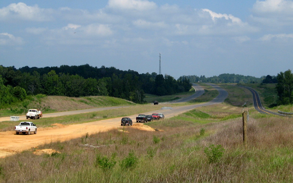Photo of view looking back along the Spencer Road extension towards the 
Cedar Square Rd interchange in Aug. 2012