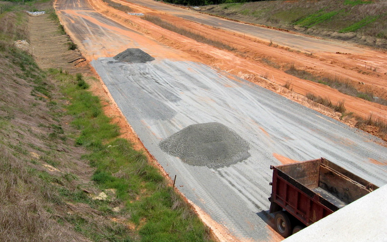 Photo of the progress in grading the future I-74 under the Plainfied Rd bridge
near Randleman, Aug. 2012
