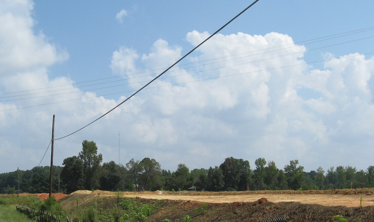Photo looking north of Branson Davis Rd showing I-74 construction progress 
in Aug. 2010