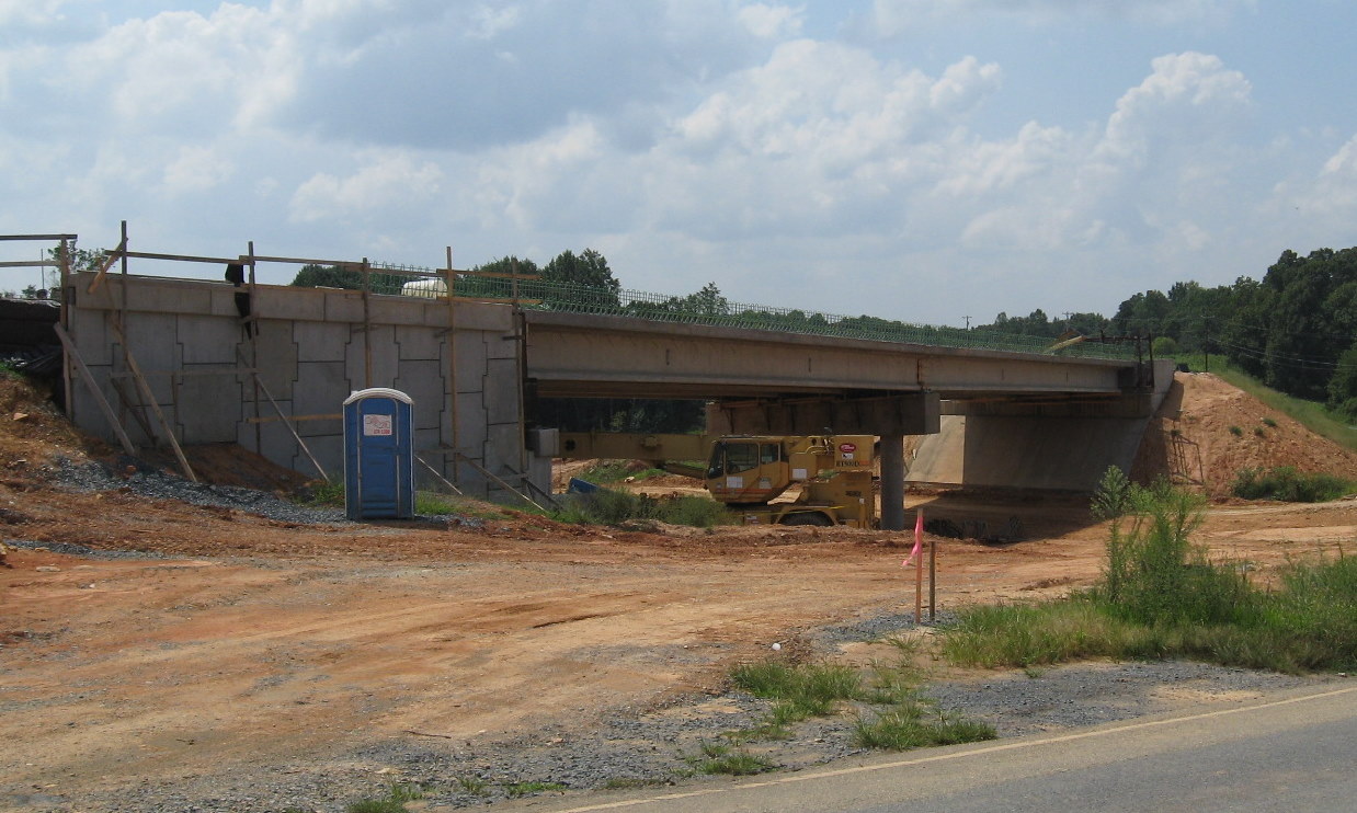 Photo of under construction Heath Dairy Rd Bridge over future I-74 freeway
near Randleman in Aug. 2010