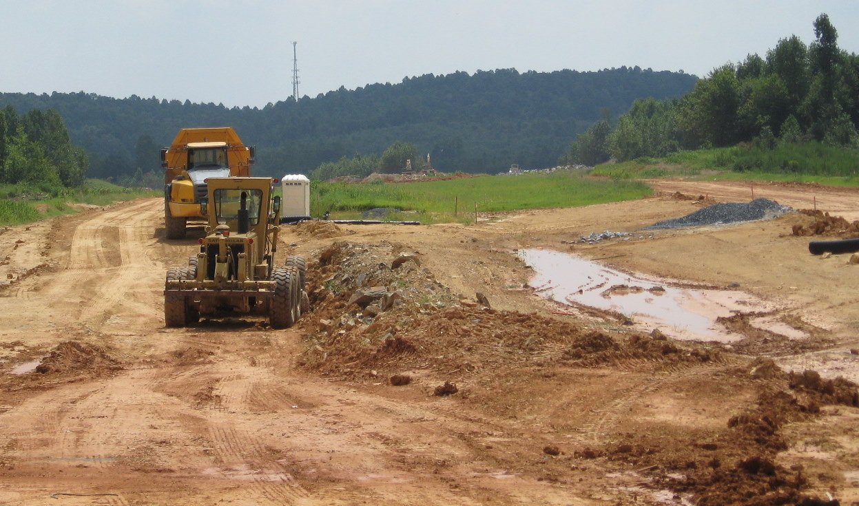 Photo of view south from under the Heath Dairy Road Bridge showing 
progress in constructing the US 220 interchange for future I-74 freeway near Randleman, Aug. 2010