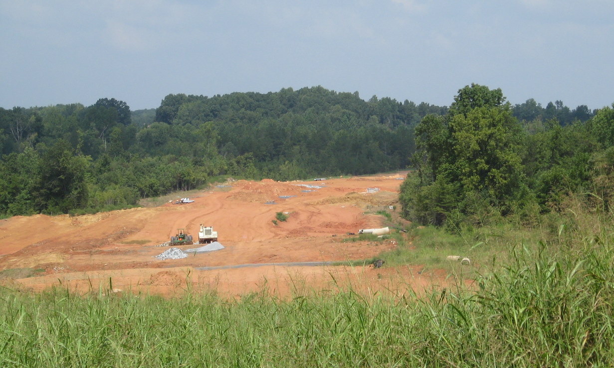 Photo of view north of Plainfield Rd Bridge showing progress in grading the 
future I-74 freeway roadbed in Aug. 2010