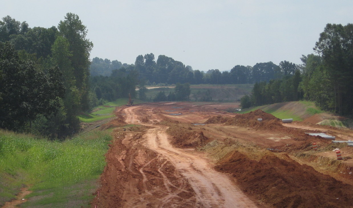 Photo from Walker Mill Road looking south along future I-74 freeway toward 
the future US 311 interchange in Aug. 2010