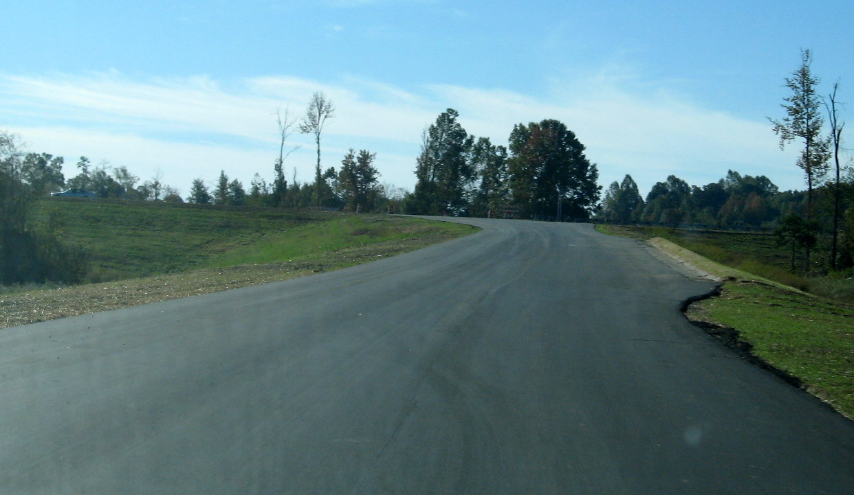 Photo of driving up unopened Cedar Square Rd offramp near Glenola from I-74 
East in Oct. 2010