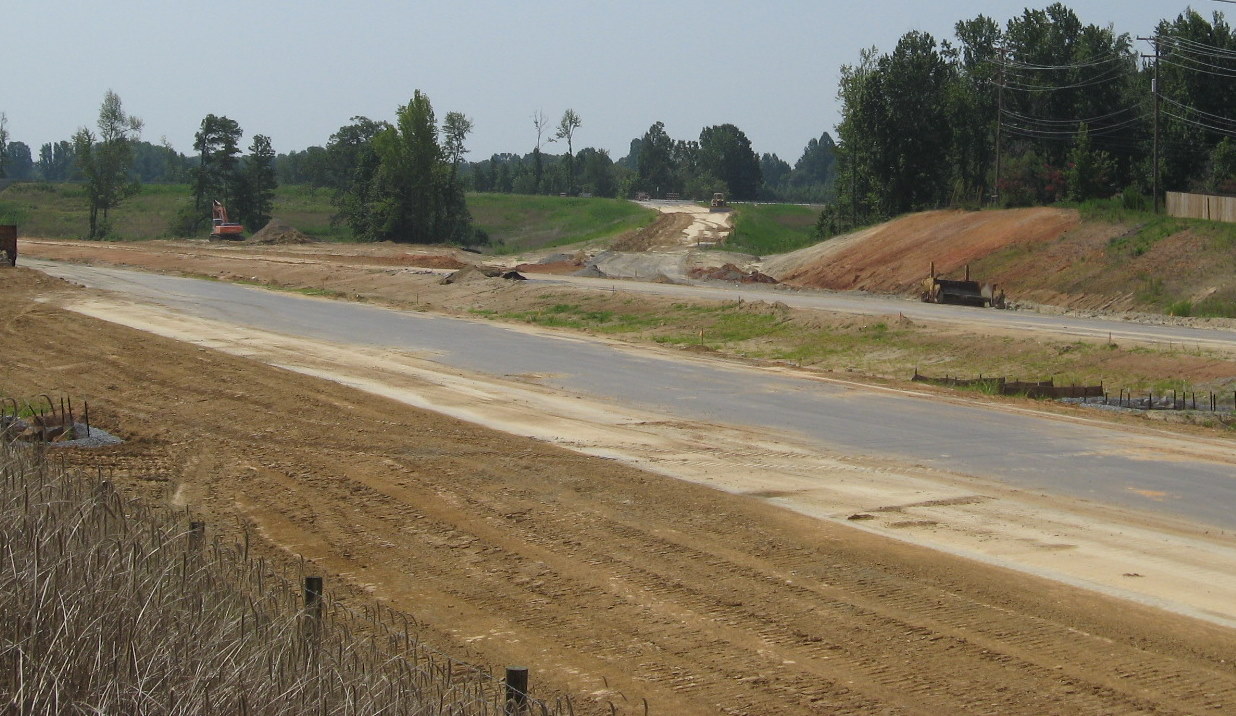 Photo of progress constructing the eastbound off-ramp for I-74 from Cedar 
Square Rd, July 2010