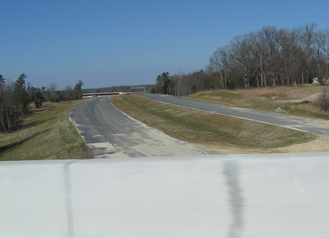 Photo of view from NC 62 bridge along I-74 freeway toward I-85 interchange 
in Jan. 2010