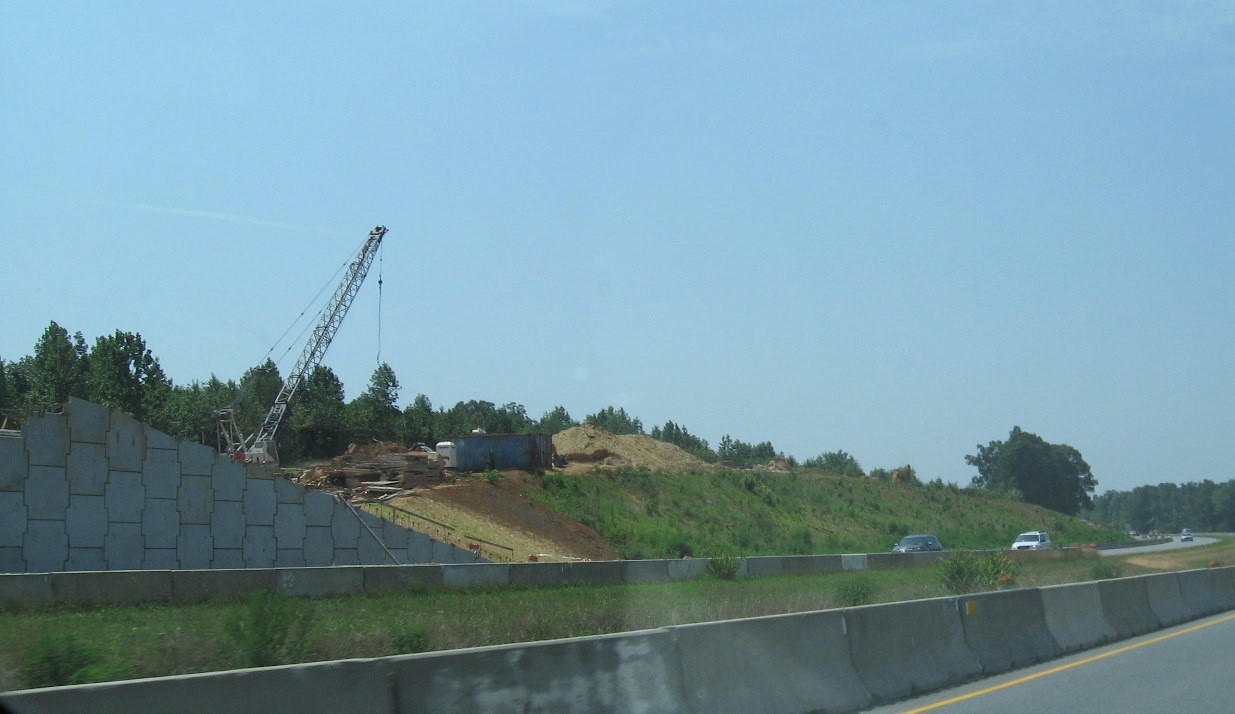 Photo of progress building future I-74 ramp bridges from US 220 South in 
Randleman, July 2010