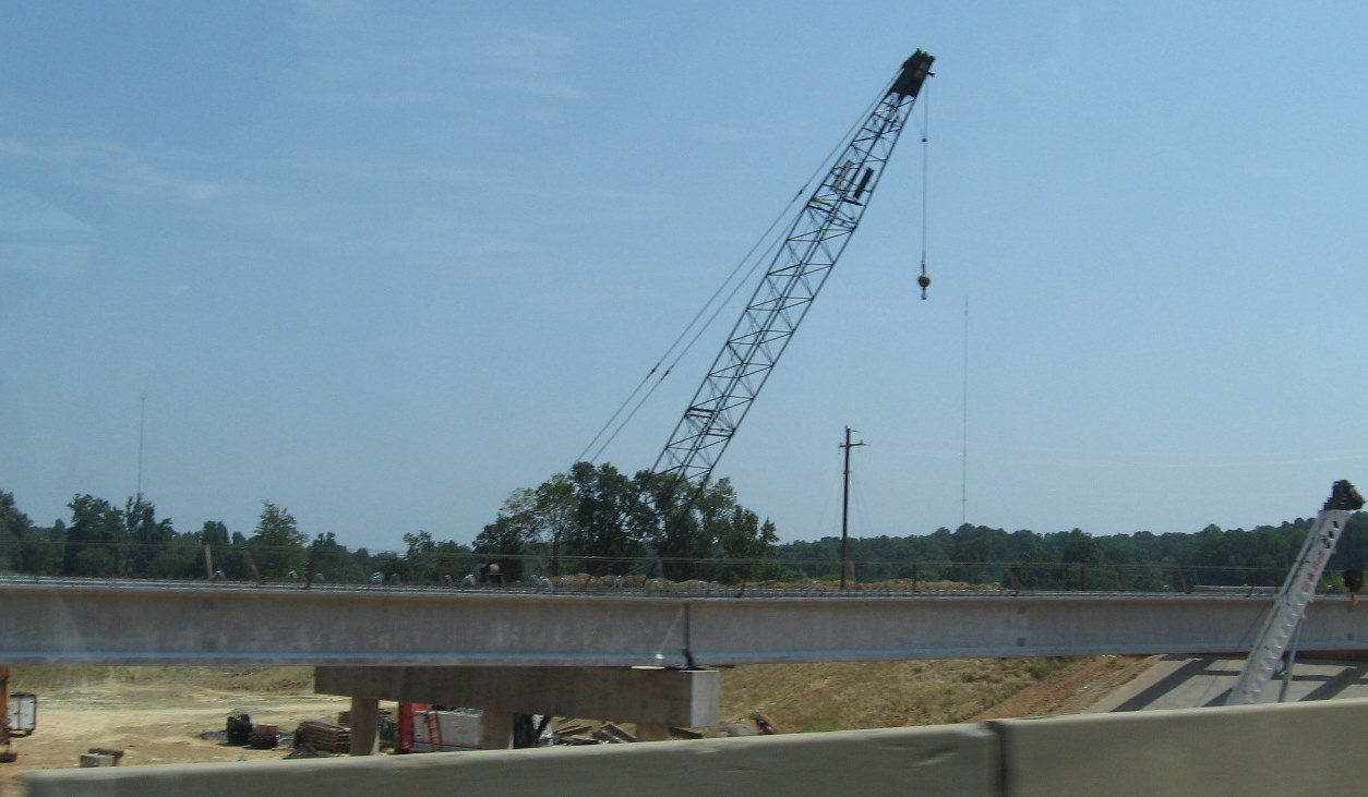 Photo of progress constructing US 311 bridge over future I-74 freeway in 
Sophia, July 2010