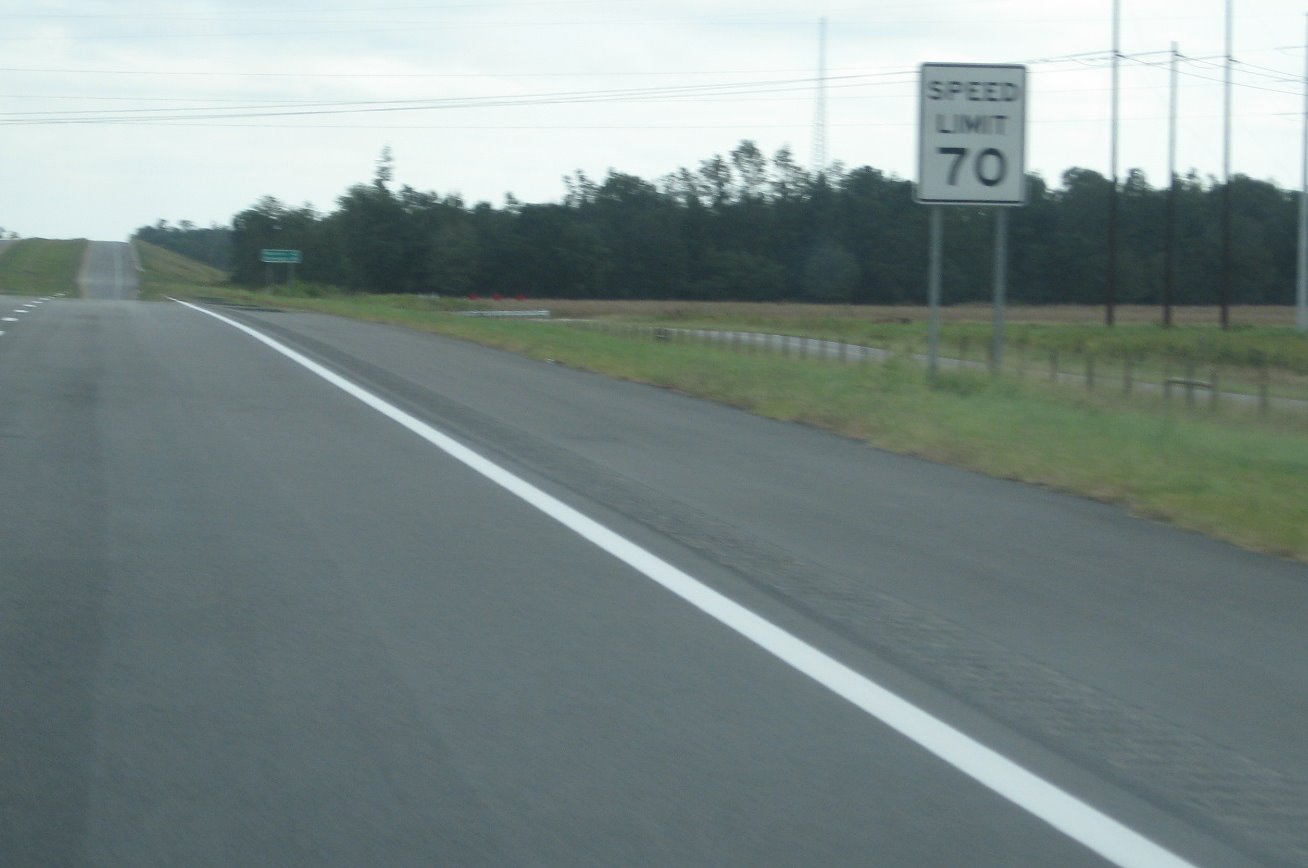 Photo of Speed Limit 70 sign on new section eastbound after NC 710 exit, Sept. 
2008