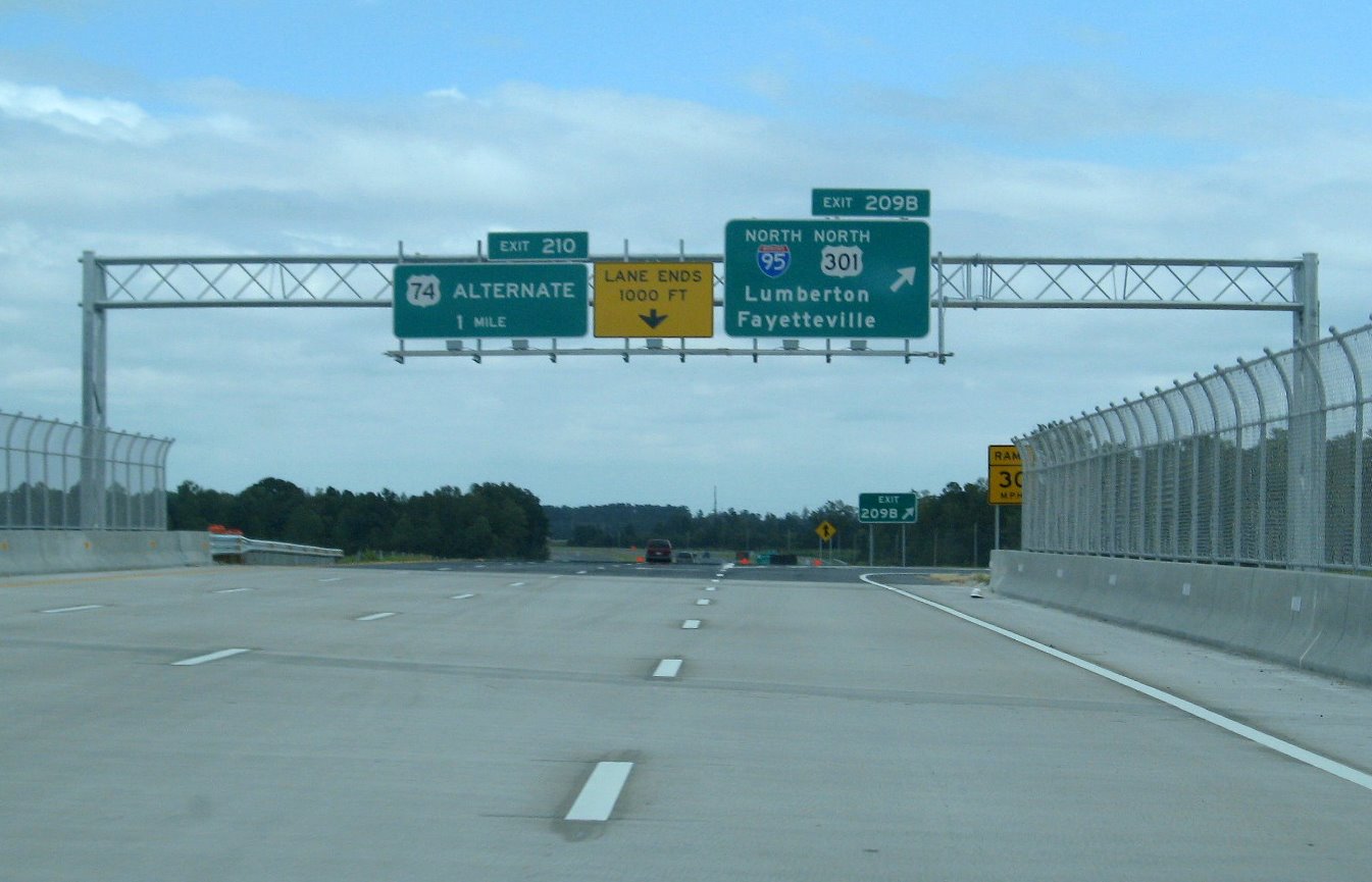 Photo closeup of signage at the I-95/US 301 north interchange on East I-74, 
Sept. 2008