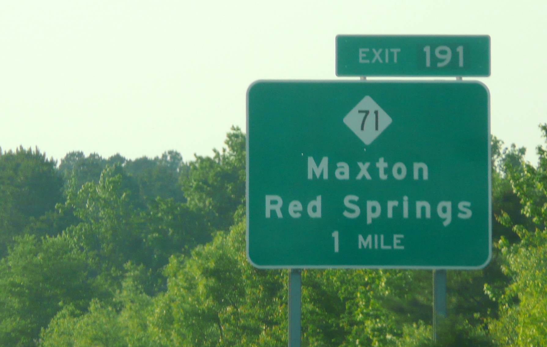 Photo of exit signage for NC 71 on West US 74, courtesy of Jim Mast in May 
2009
