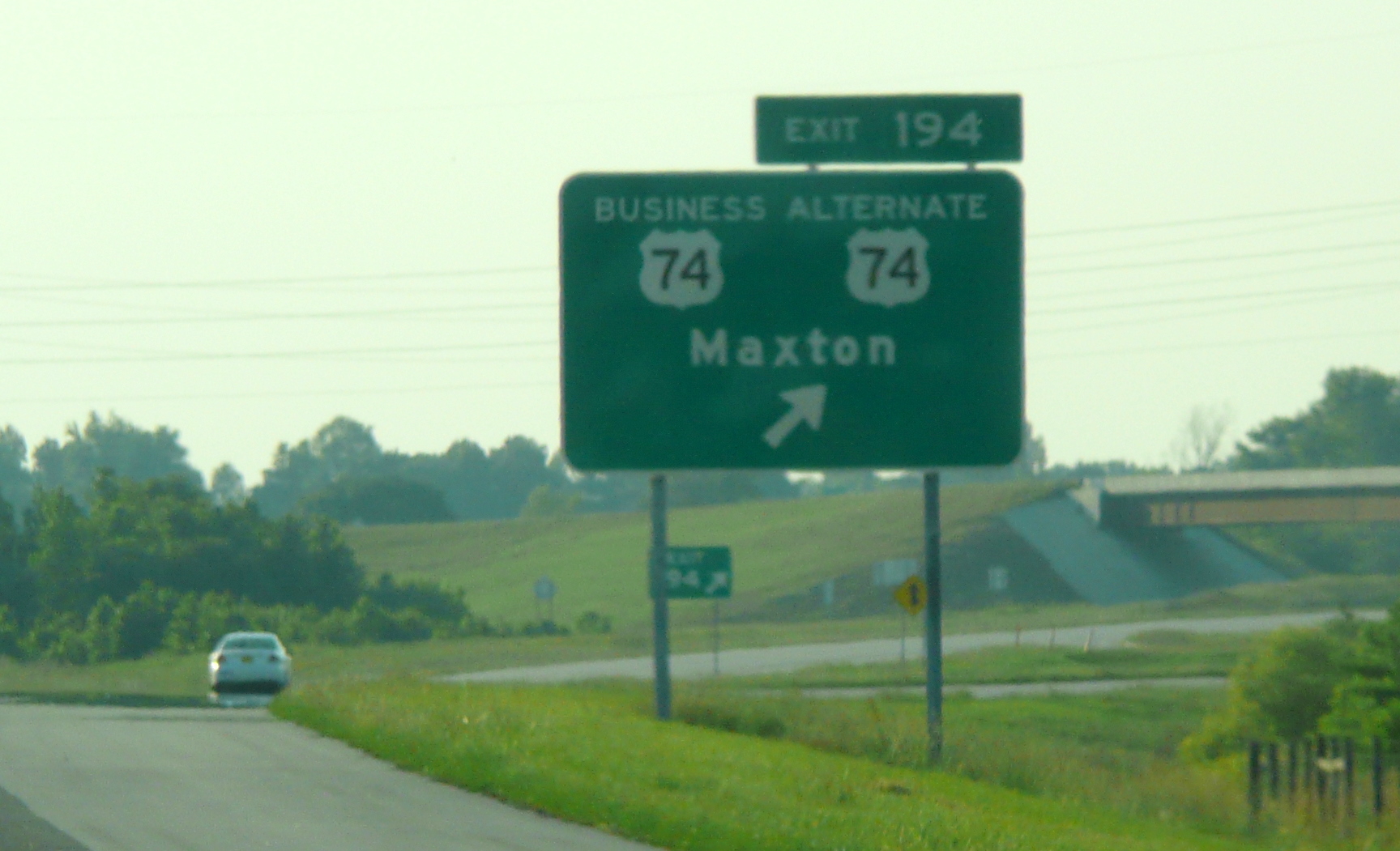 Photo of the signage at the Alt US 74/Bus. US 74 interchange near Alma in May 
2009, courtesy of James Mast