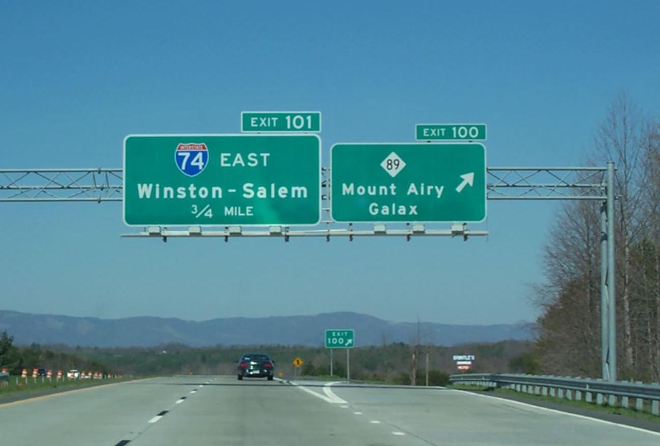 Photo of I-74 Exit signage on North I-77 at Exit 100