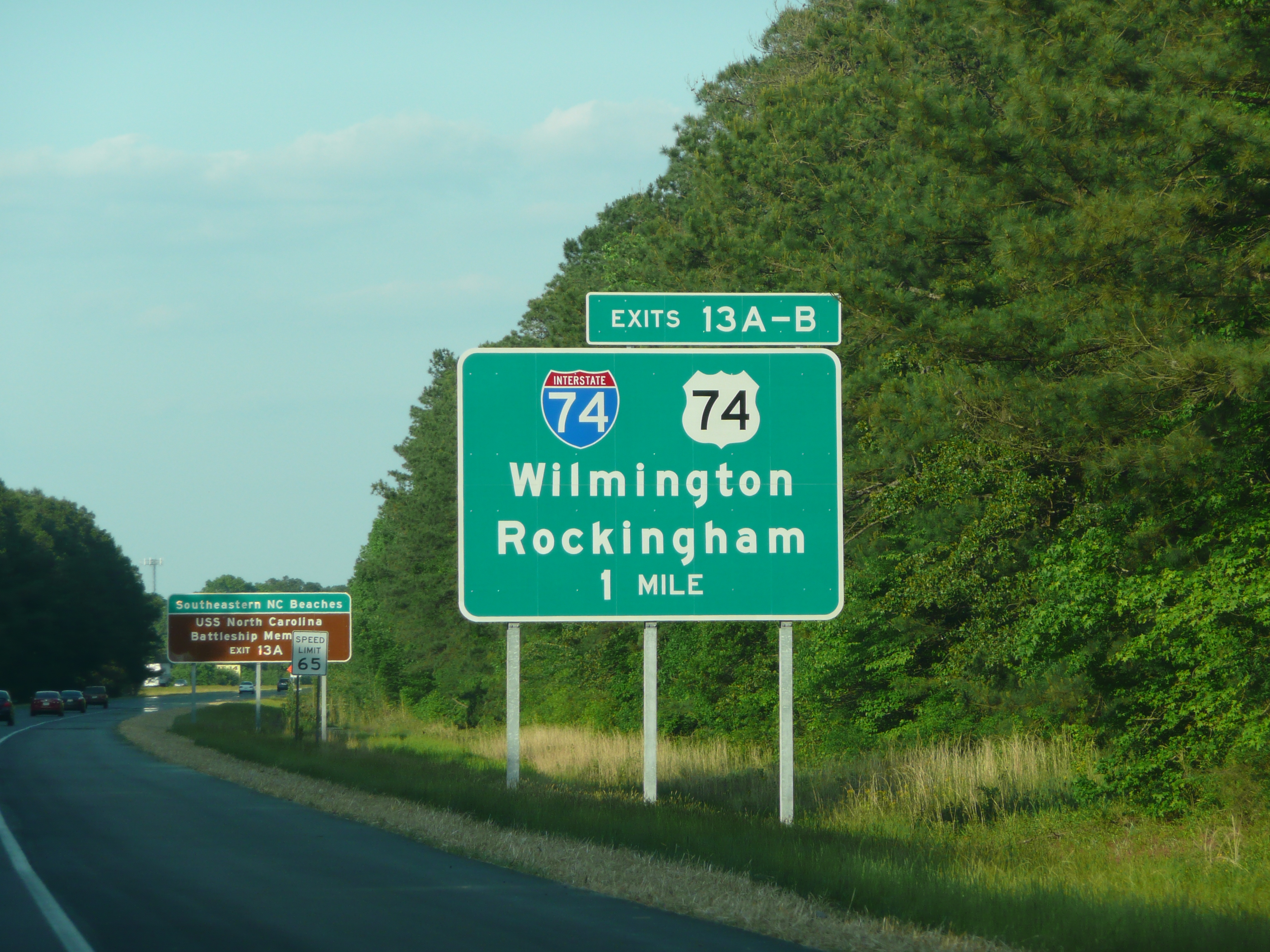 Photo of the 1 mile I-74/US 74 exit sign on I-95 South near Lumberton in May 
2009