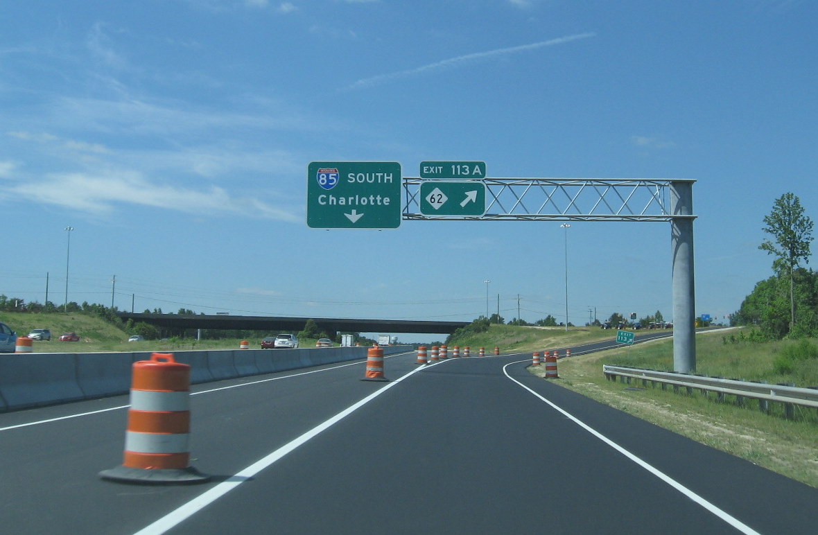 Photo of new exit signage for I-74 and NC 62 interchange on I-85 South in 
May 2010