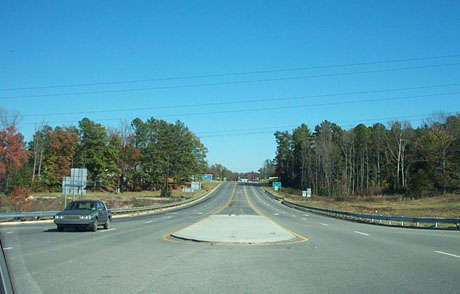 Photo of intersection signage at US 1/US 74 (Future I-74) interchange in Rockingham
