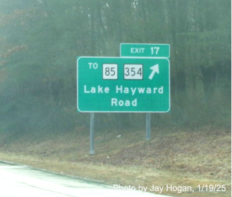 Image of recently placed ground mounted ramp sign for CT 85/CT 354 exit with new 
	milepost based exit number on CT 11 South in Colchester, by Jay Hogan, January 2025