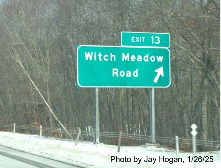 Image of recently placed ramp sign for Witch Meadow Road exit with new 
	milepost based exit number on CT 11 North in Colchester, by Jay Hogan, January 2025