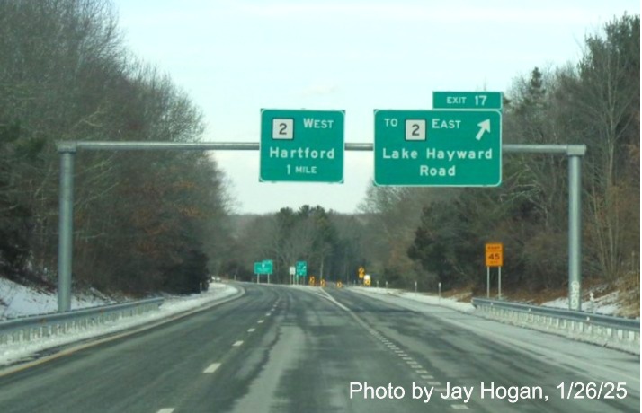 Image of recently placed overhead ramp sign for CT 2 East exit with new 
	milepost based exit number at end of CT 11 North in Colchester, by Jay Hogan, January 2025