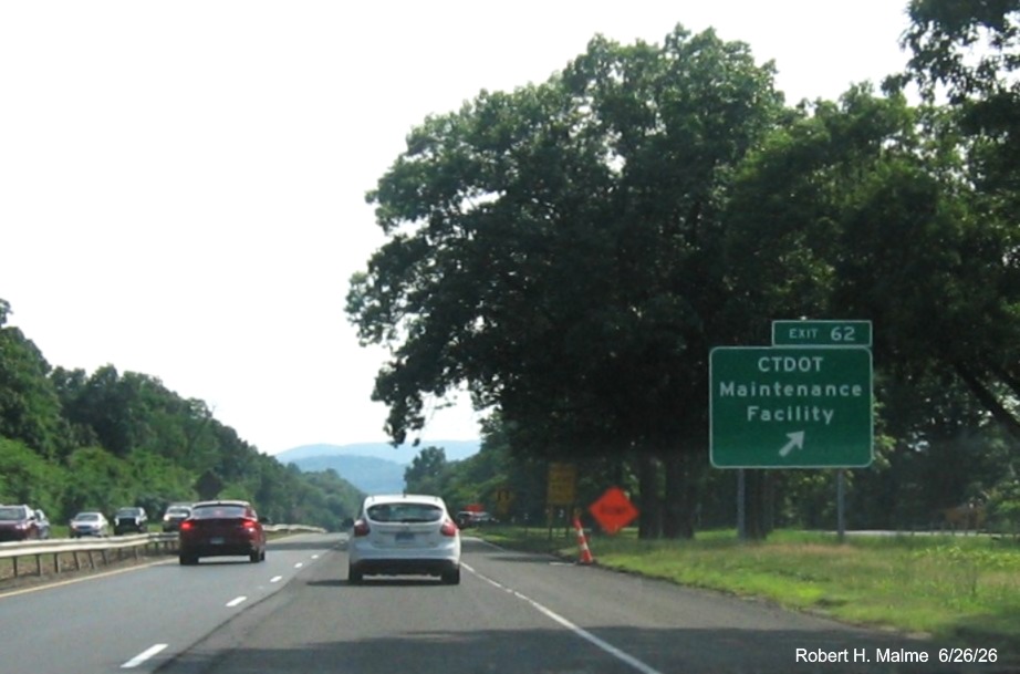 Image of ground mounted ramp sign for the CTDOT Maintenance Facility exit, with new milepost 
 based exit number on CT 15 North/Cross Parkway in Meriden, June 2026