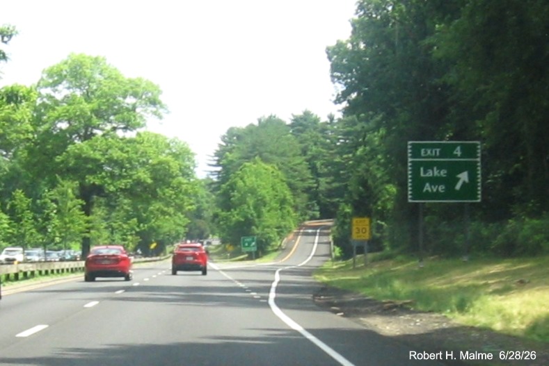 Image of exit sign for the Lake Avenue exit, with new milepost based number 
 on CT 15 North/Merritt Parkway in Greenwich