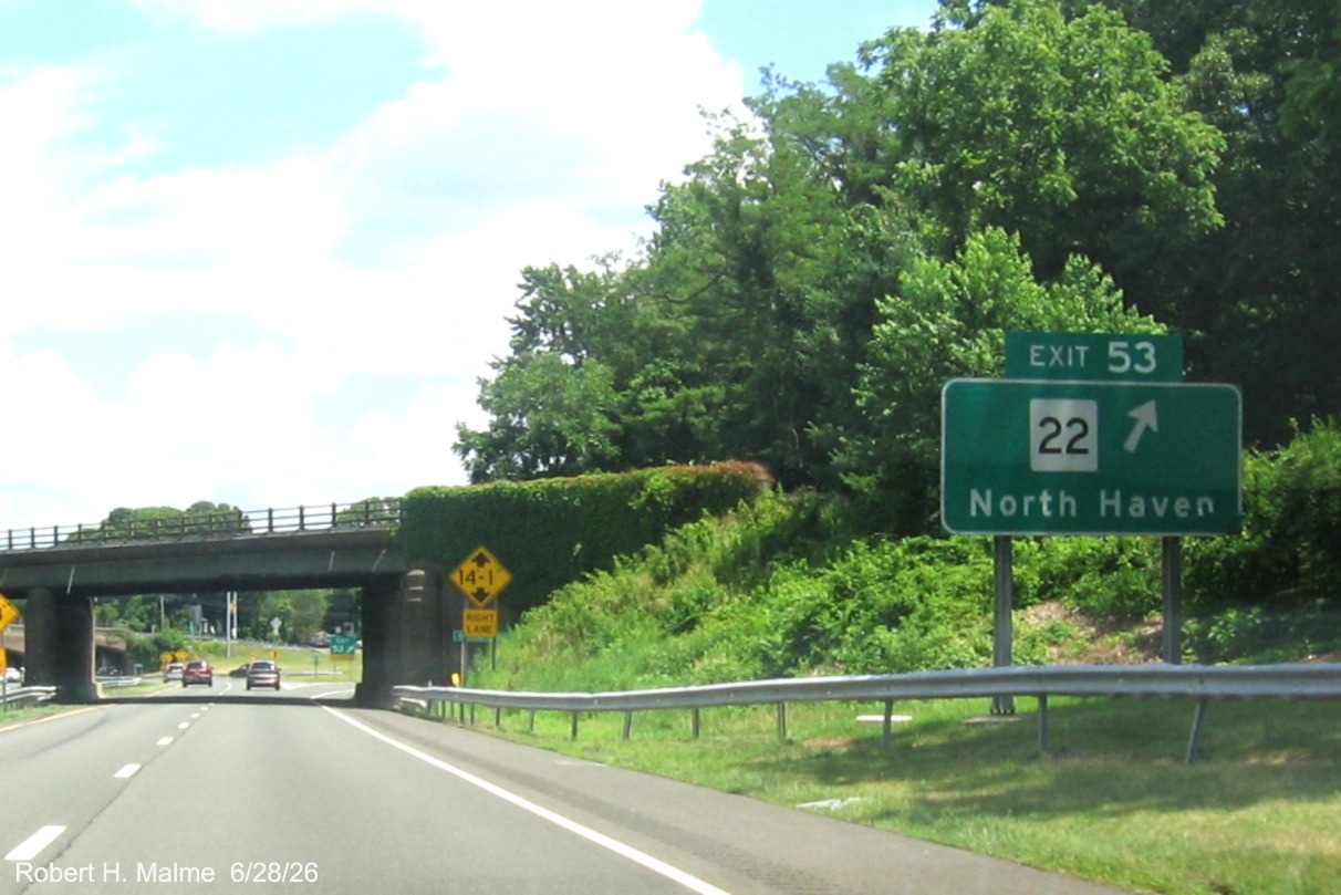 Image of ground mounted 1 Mile advance sign for the CT 22 exit, with new milepost 
 based exit number on CT 15 North/Cross Parkway in North Haven, June 2026