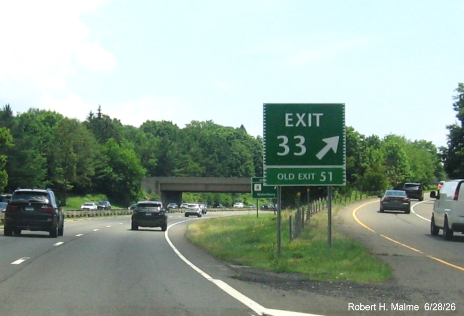 Image of gore sign for the CT 108 exit, with new milepost based exit number and Old Exit 51 
 sign on support post on CT 15 North/Merritt Parkway in Trumbull, June 2026