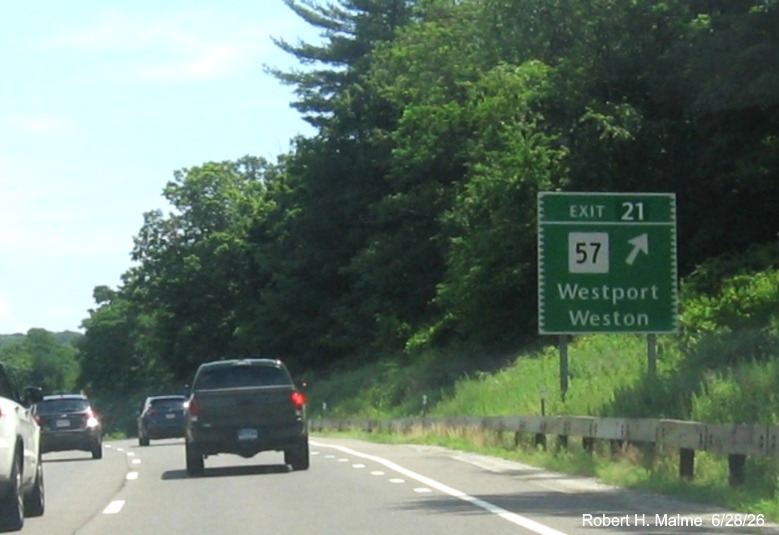 Image of the ground mounted ramp sign for the CT 57 exit, with new 
 milepost based exit number on CT 15 North/Merritt Parkway in Westport, June 2026