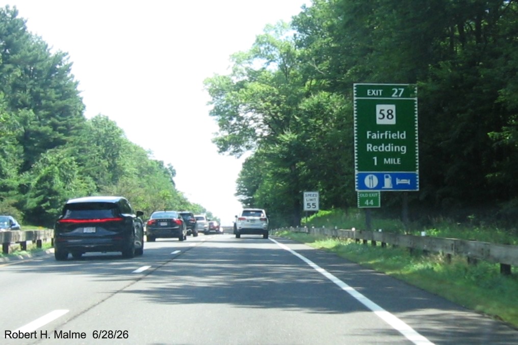 Image of 1 mile advance sign for the CT 58 exit, with new milepost based exit 
 number and Old Exit 44 sign on support post on CT 15 North/Merritt Parkway in Fairfield, June 2026