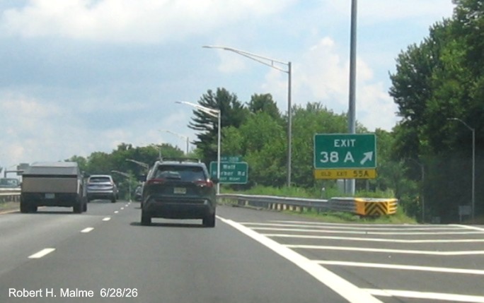 Image of gore sign for the Wheelers Farm Road exit, with new milepost based 
 exit number on CT 15 North/Cross Parkway in Milford, June 2026