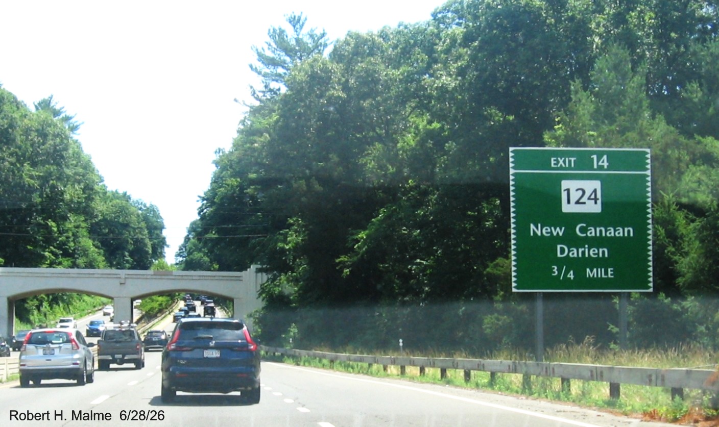 Image of 3/4 Mile advance sign for the CT 124 exit, now with new milepost based exit 
 number on CT 15 North/Merritt Parkway in New Canaan
