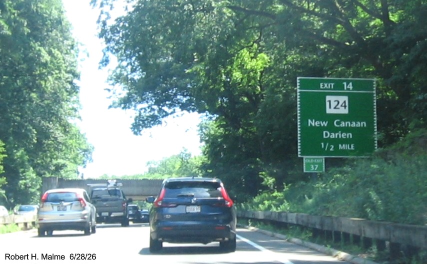 Image of 1/2 Mile advance sign for the CT 124 exit, now with new milepost based exit 
 number on CT 15 North/Merritt Parkway in New Canaan