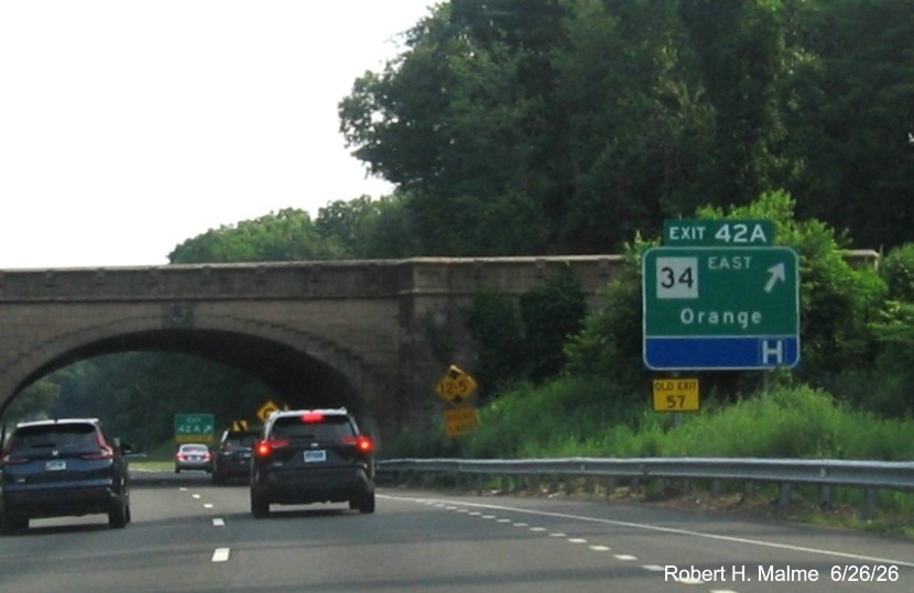 Image of ground mounted exit sign for the CT 34 East exit, with new milepost based exit number 
 on CT 15 South/Cross Parkway in Derby, June 2026