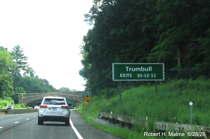 Image of ground mounted auxiliary sign for Bridgeport exits, with new milepost 
 based exit number on CT 15 North/Merritt Parkway, June 2026