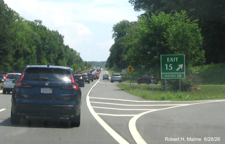 Image of gore sign for the CT 123 exit, now with new milepost based exit number 
 and small Old Exit 38 sign on support post on CT 15 North/Merritt Parkway in Norwalk