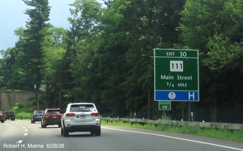 Image of 3/4 Mile advance sign for the CT 111/Main Street exit, with new milepost based exit 
 number and Old Exit 48 sign on support post on CT 15 North/Merritt Parkway in Bridgeport, June 2026