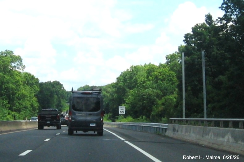 Image of post for future ground mounted 1 mile advance sign for the CT 10 exit on CT 15 
 North/Cross Parkway in Hamden, June 2026
