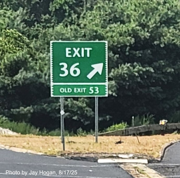 Image of gore sign for the CT 110 exit, with new milepost based exit 
 number and Old Exit 53 sign below on CT 15 South/Merritt Parkway in Stratford, by Jay Hogan, August 2025