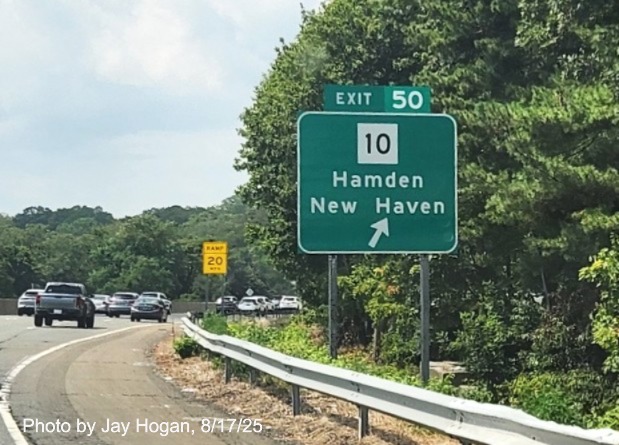 Image of ground mounted ramp sign for the CT 10 exit, with 
 new milepost based exit number on CT 15 South/Cross Parkway in Hamden, by Jay Hogan, August 2025