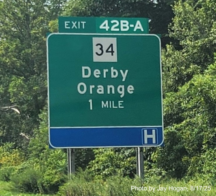 Image of 1 mile advance ground mounted sign for the CT 34 exit, with 
 new milepost based exit number on CT 15 South/Cross Parkway in Derby, by Jay Hogan, August 2025