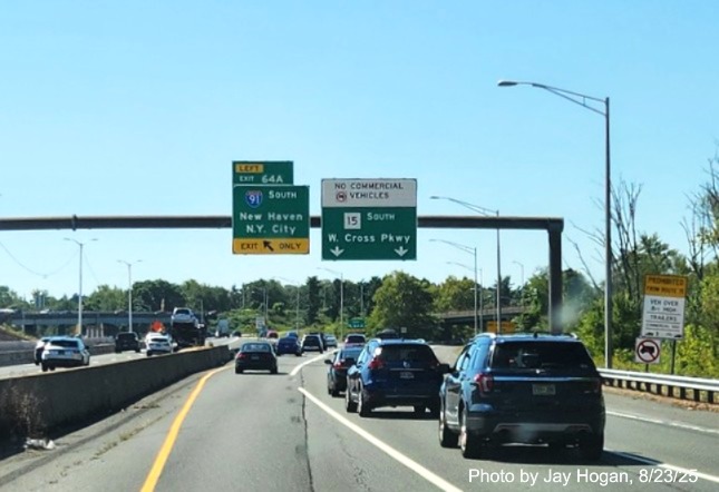 Image of overhead ramp sign for the I-91 South exit, with new milepost based exit number 
 on CT 15 South/Cross Parkway in Meriden, by Jay Hogan, August 2025