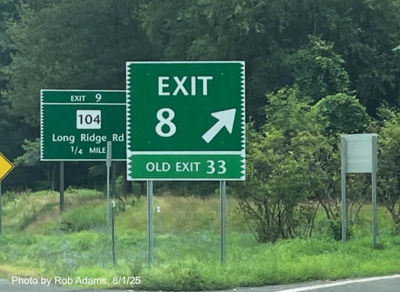 Gore sign for CT 155 exit, with new milepost based number on CT 15 North/Merritt Parkway 
 in Stamford