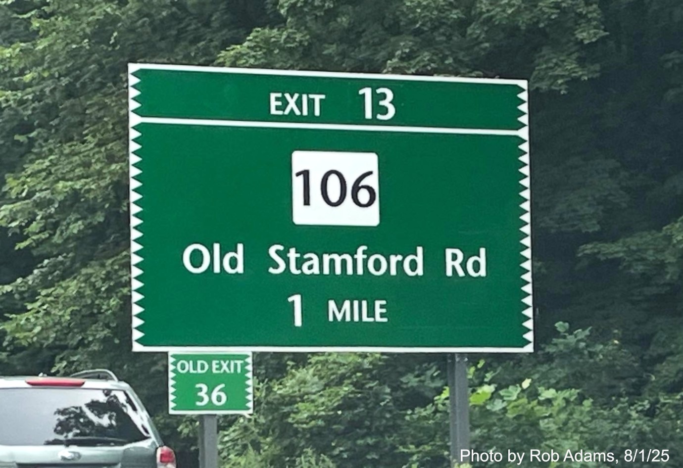 Image of 1 Mile advance sign for the CT 106 exit, now with new milepost based exit number 
 and small Old Exit 36 sign on support post on CT 15 North/Merritt Parkway in New Canaan