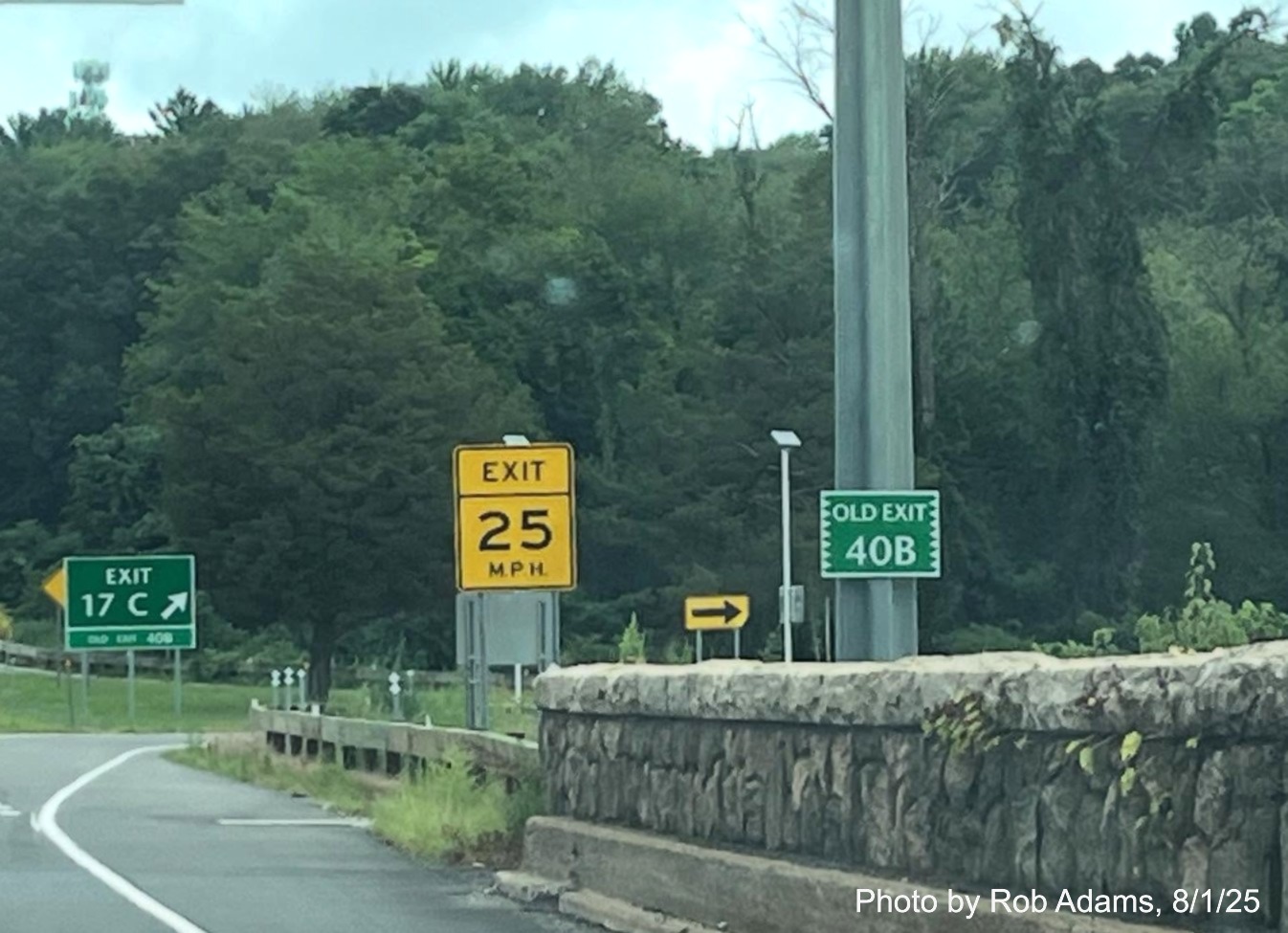 Image of green Old EXIT 40B sign on gantry for Main Avenue North ramp sign on CT 15 
 North/Merritt Parkway in Norwalk