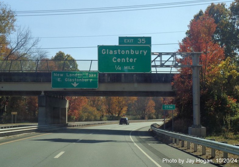 Image of new 1/4 mile advance overhead sign for Glastonbury Center exit with new milepost based exit number on CT 17 South, by Jay Hogan, October 2024