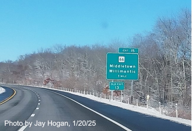 Image of ground mounted 1 Mile advance sign for CT 66 exit with new milepost based
	  exit number and Old Exit 13 sign in front on CT 2 West in Marlborough, by Jay Hogan, January 2025